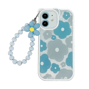 A woman holds a cell phone with a floral case, showcasing the iPhone 16 Case from