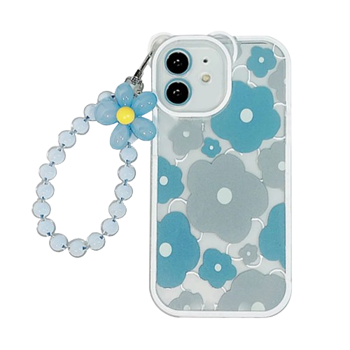 A woman holds a cell phone with a floral case, showcasing the iPhone 16 Case from