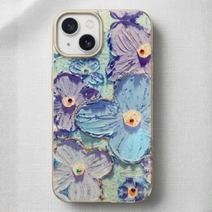 Colorful blue and purple retro floral iPhone case with textured flower design and gold accents, diamond-style shockproof cover by Eliza